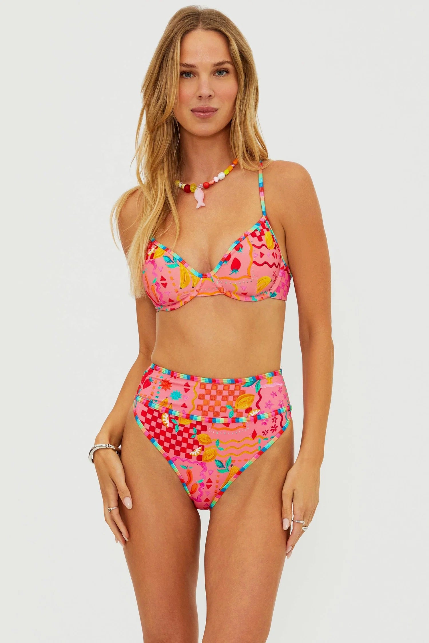 Beachriot Kori Top in passion fruit color, featuring a stylish bikini top with vibrant tropical print and adjustable straps.