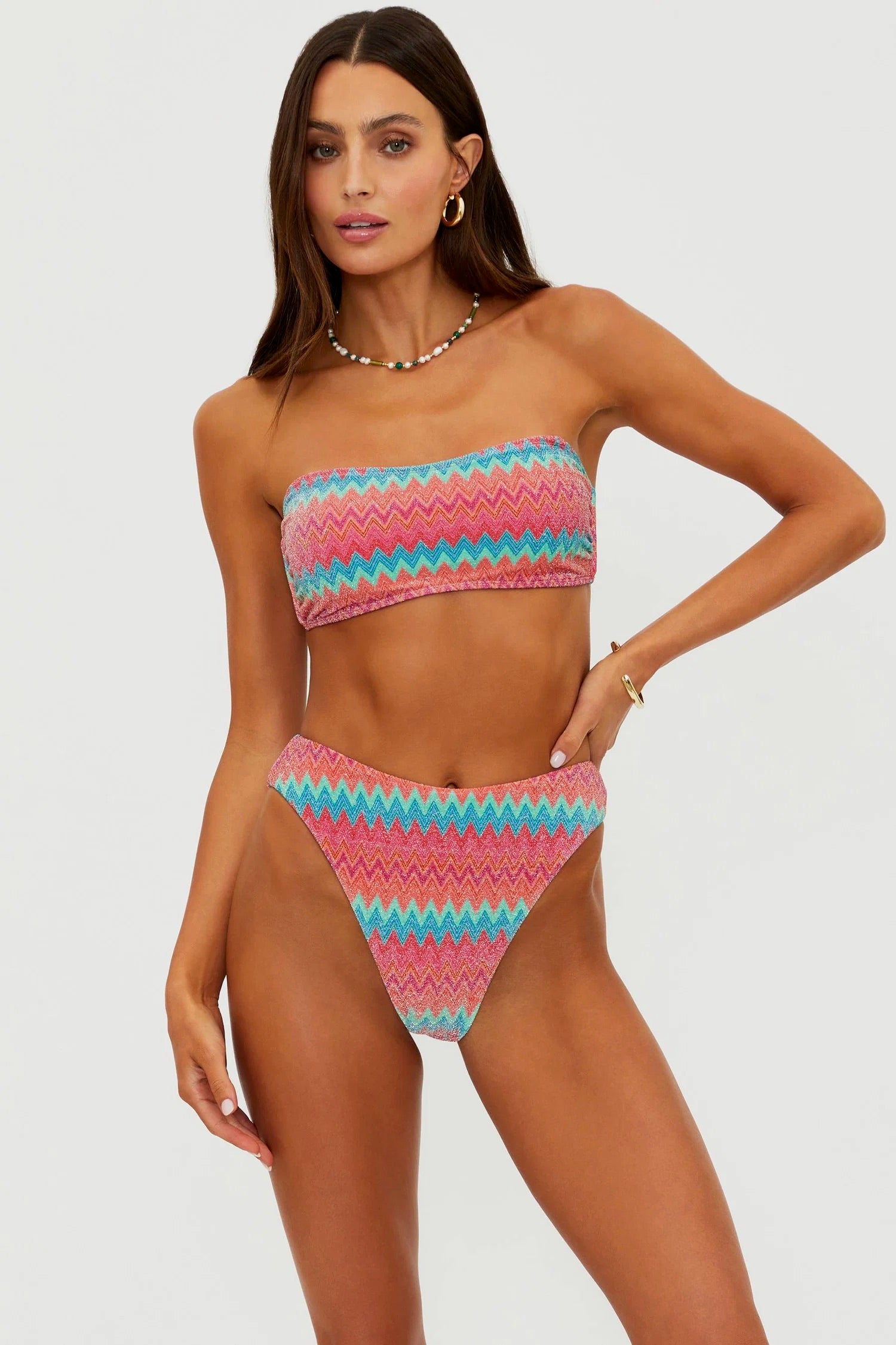 BeachRiot Kelsey Top in Strawberry Ice Chevron featuring a stylish, patterned bikini top with vibrant red and white chevron design.