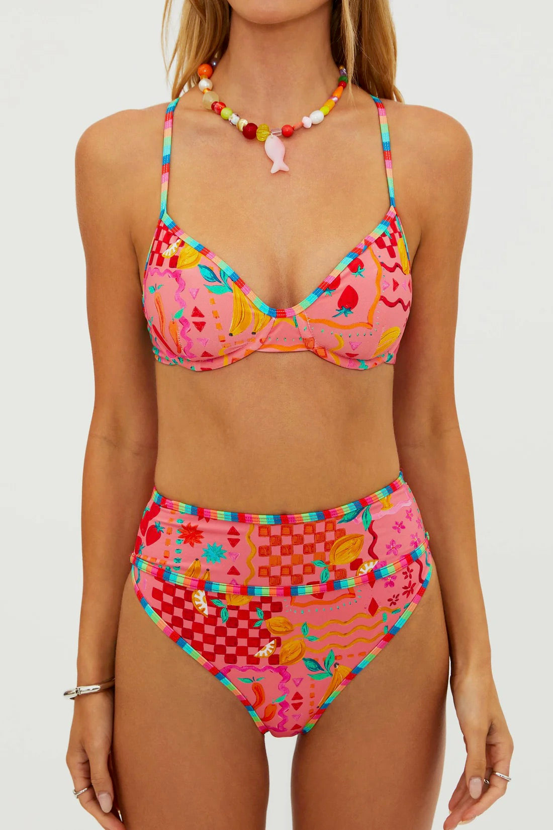 Beach Riot Kori Top in Passion Fruit, vibrant bikini top with string ties, featuring tropical floral print and adjustable fit.