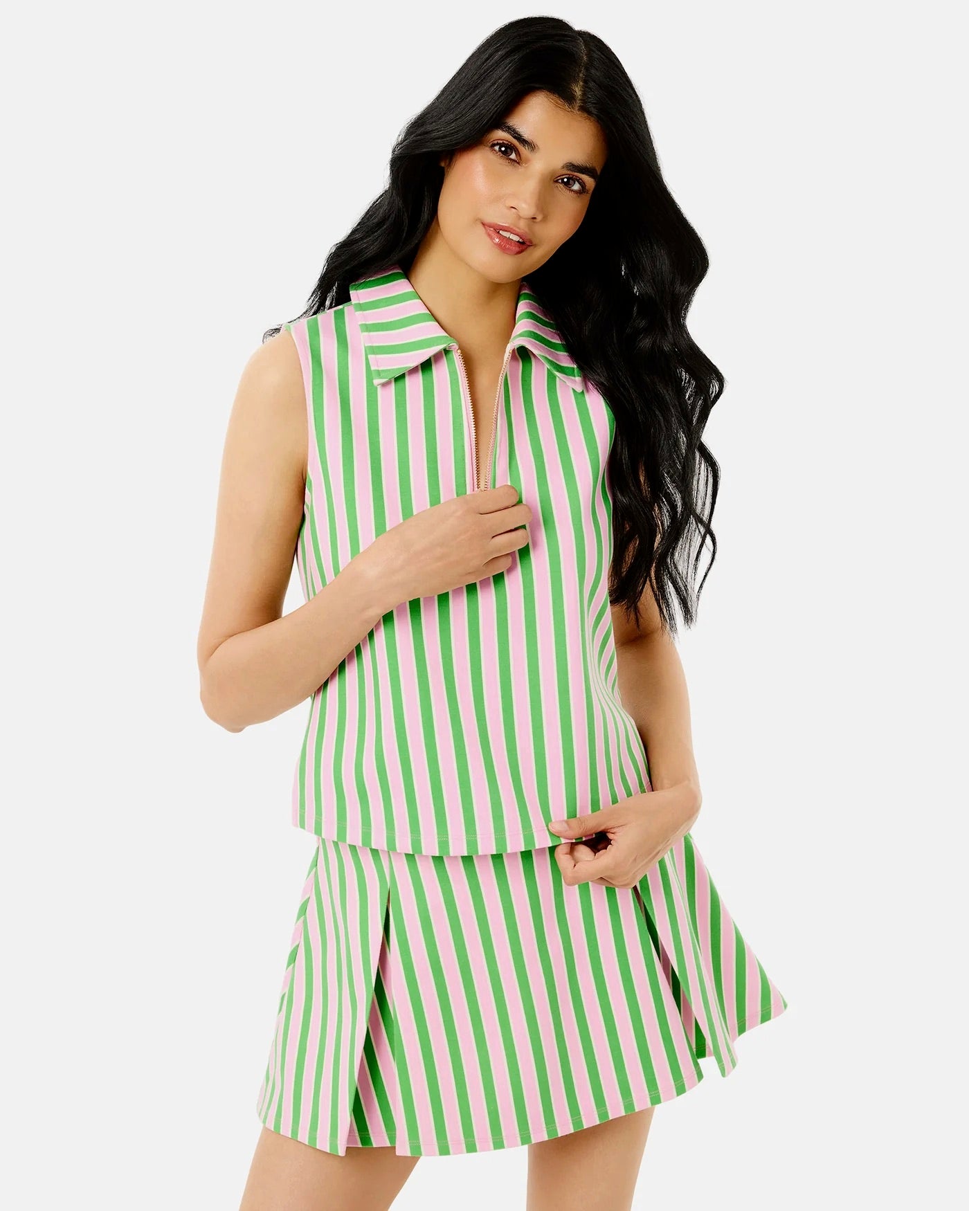 Addison Bay sleeveless Virginian Polo in Key Lime and Bubblegum, shown with vibrant fabric and classic polo collar.