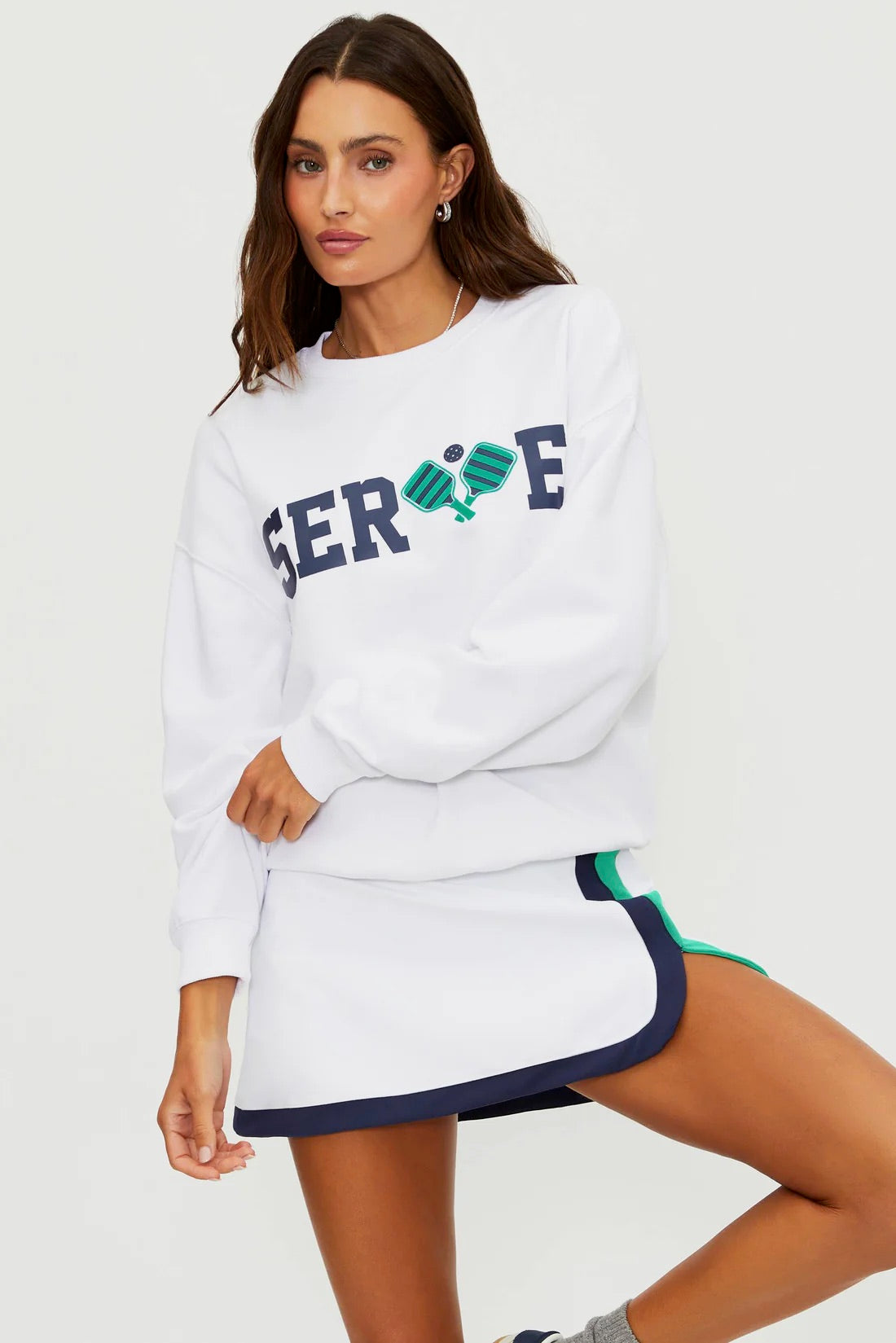 BeachRiot Devyn oversized white sweatshirt displayed on a hanger, featuring a relaxed fit and soft fabric for casual comfort.