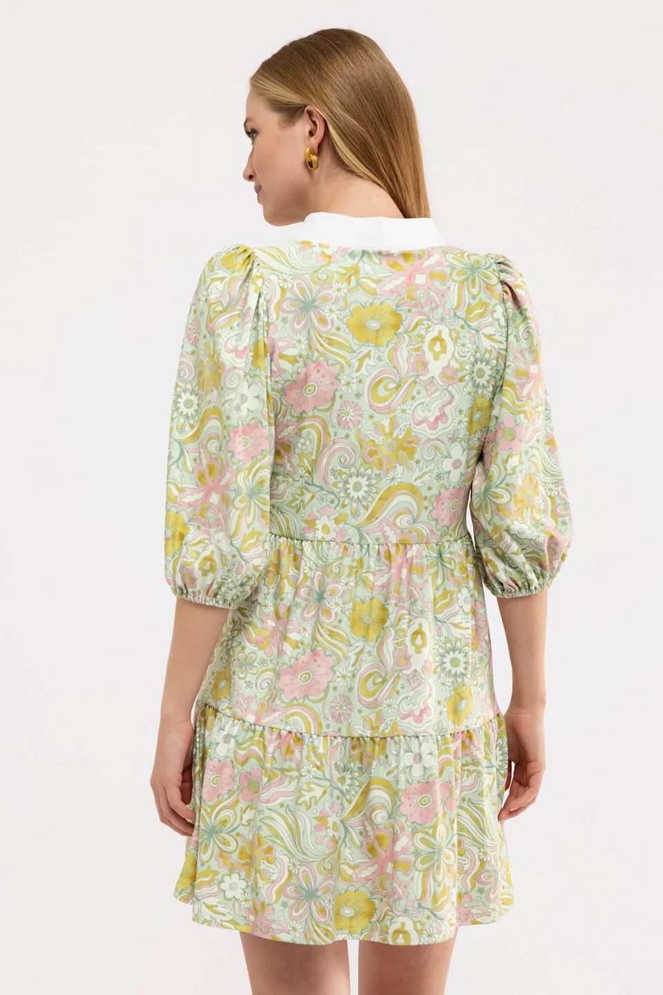 Smith & Quinn Tory Dress Starry Eyed featuring a celestial print, sleeveless design, and flowing fabric on a model.