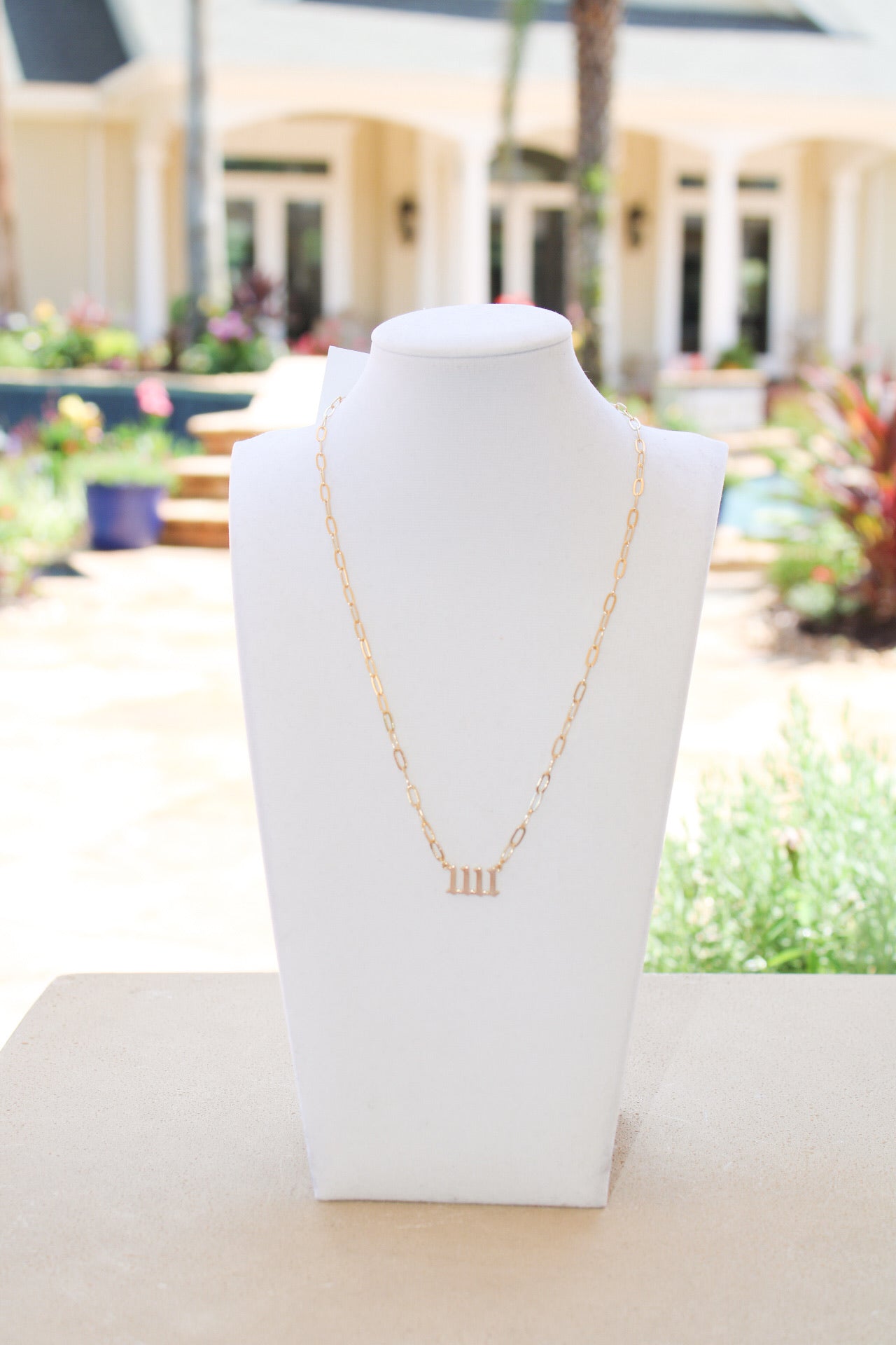 Golden Stella Angel No. pendant necklace featuring a delicate angel charm on a fine chain, jewelry accessory for women.