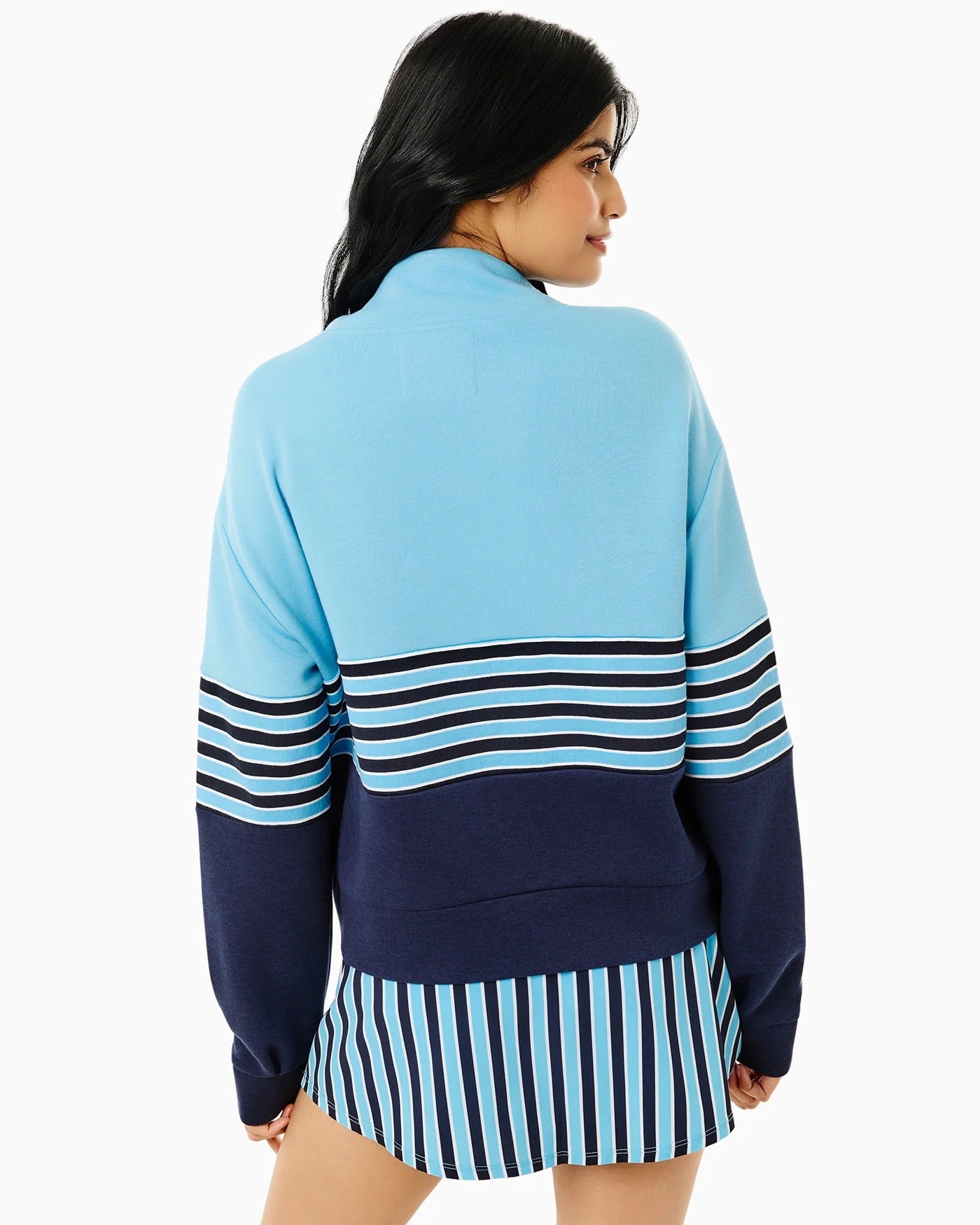 Addison Bay JV quarter zip sweatshirt in vintage blue and navy stripe, showing the stylish collar and color pattern.