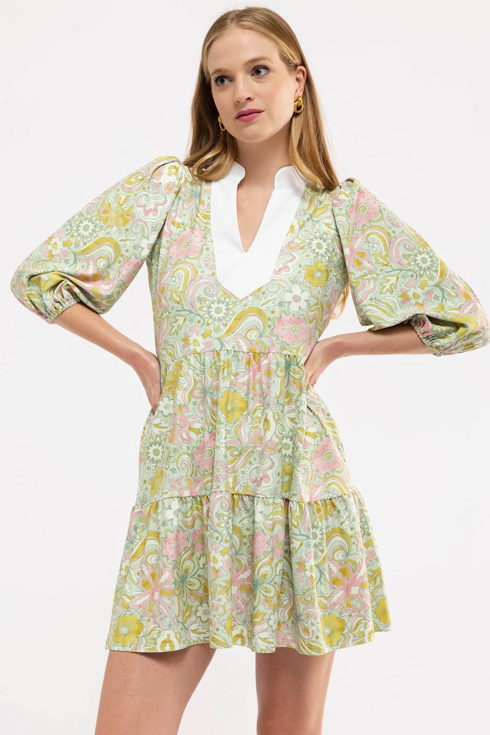 Smith & Quinn Tory Starry Eyed dress displayed on a hanger with a starry pattern and elegant silhouette.