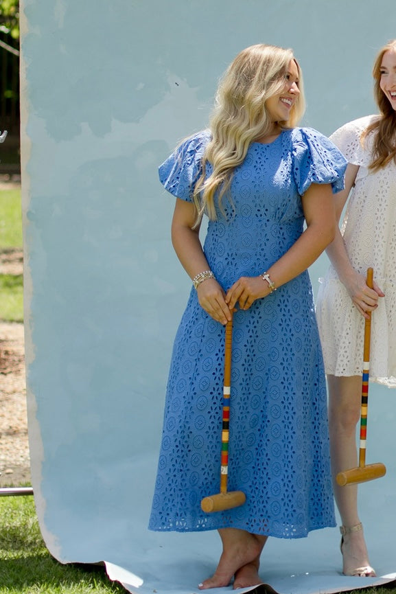 CLEOBELLA Leslie Midi Dress in Blue Bonnet fabric, featuring a flowing silhouette and elegant design, displayed on a mannequin.