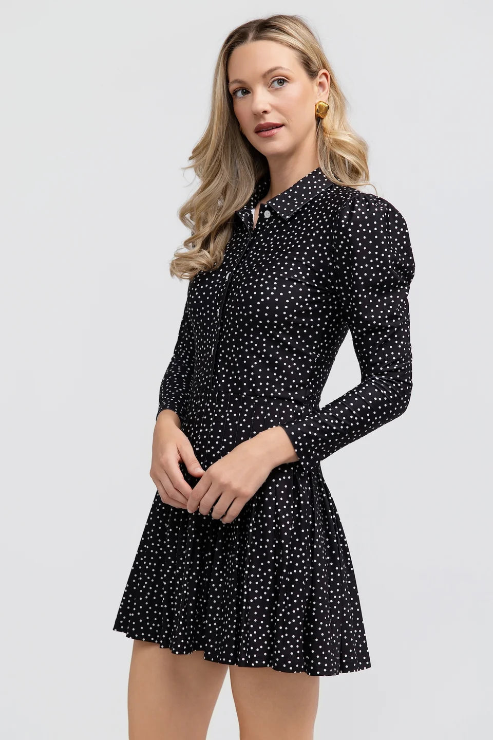 Smith & Quinn Edith Dress in Dainty Dot Black with a fitted bodice and flowy skirt, showcasing the stylish dotted pattern.