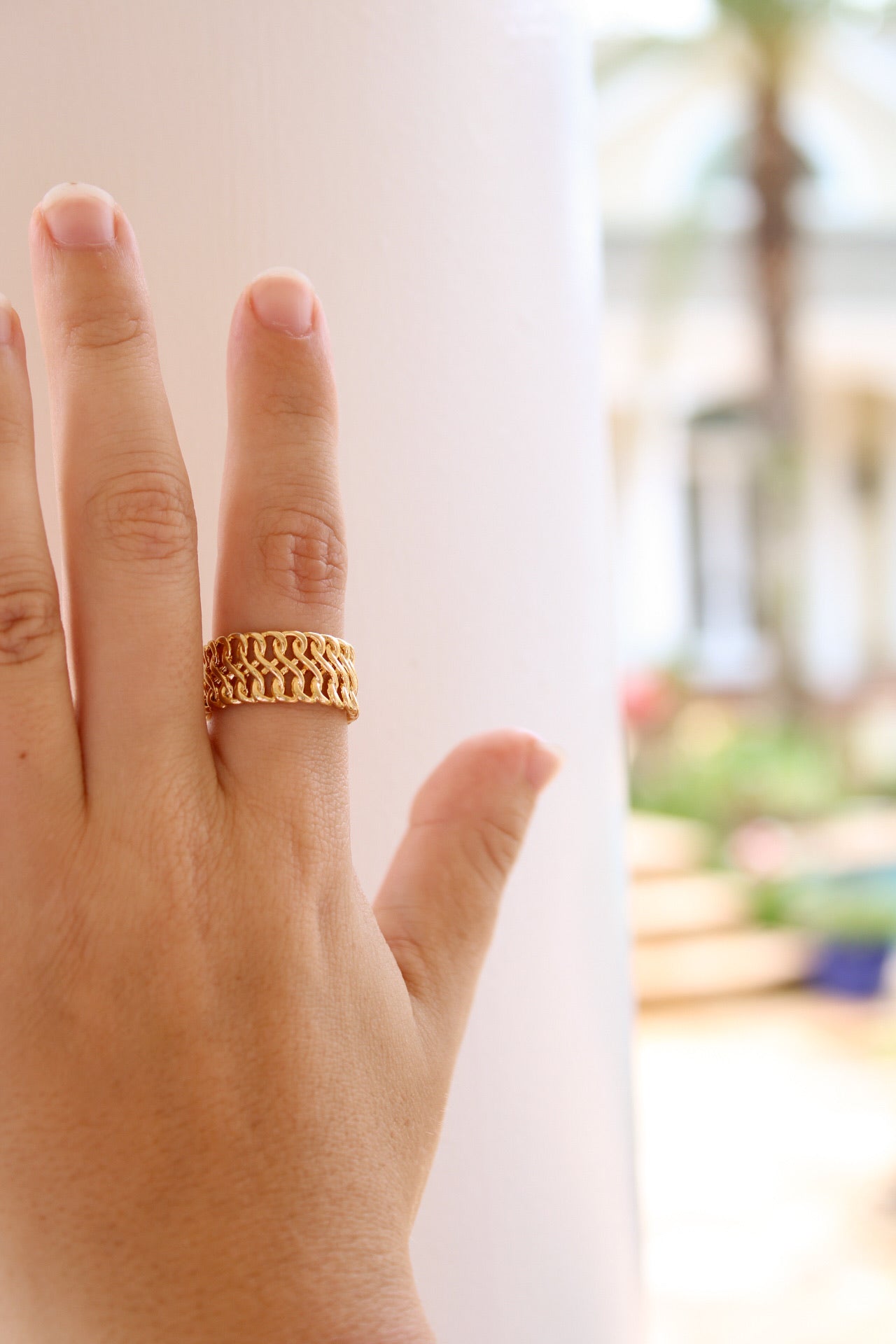 Golden Stella Mother Teresa ring featuring a detailed portrait and elegant design, crafted in silver with a polished finish.