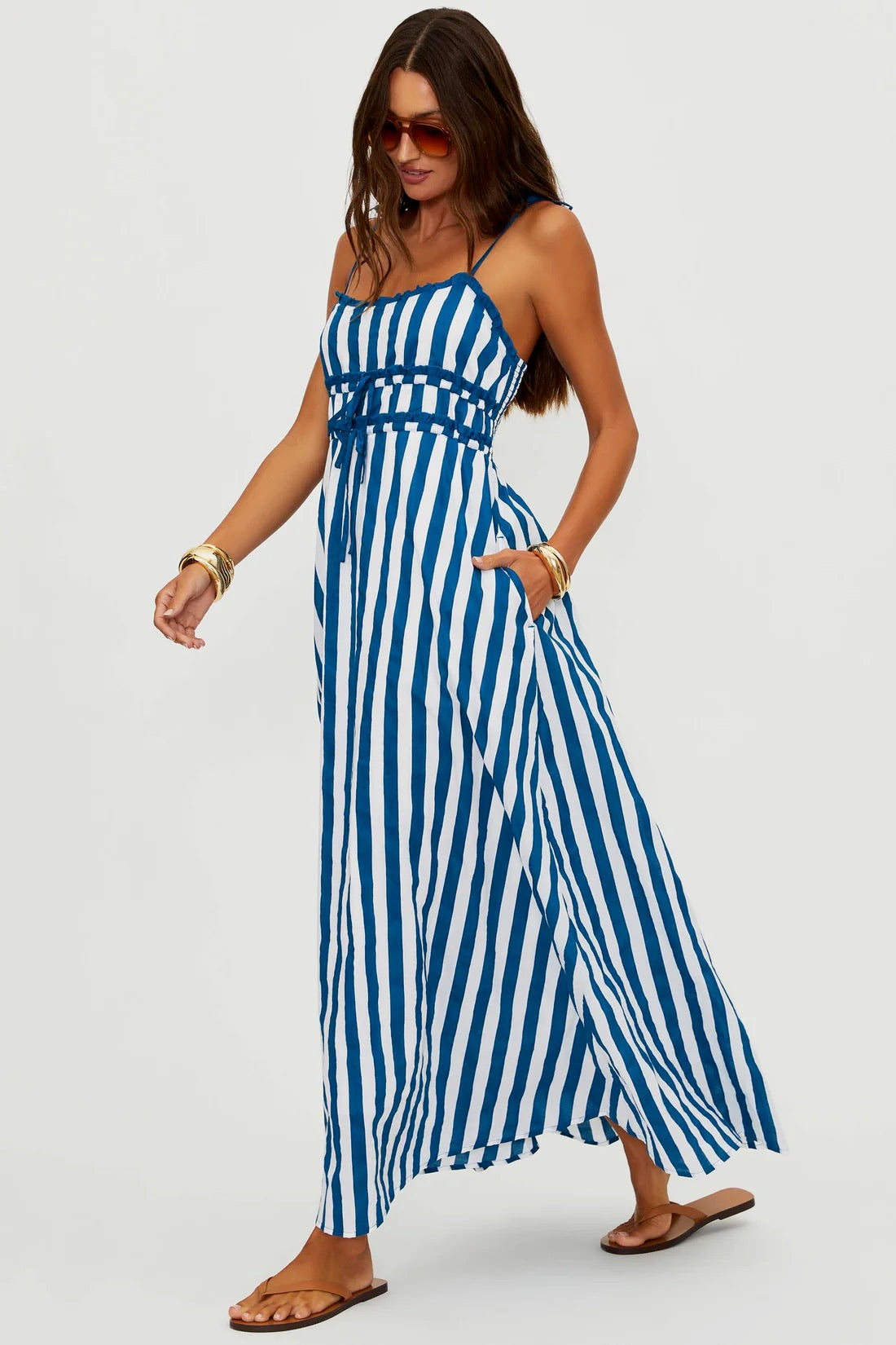 Levie Maxi Dress by BEACHRIOT in Twilight Tides Stripes featuring a flowing silhouette and vibrant striped pattern.