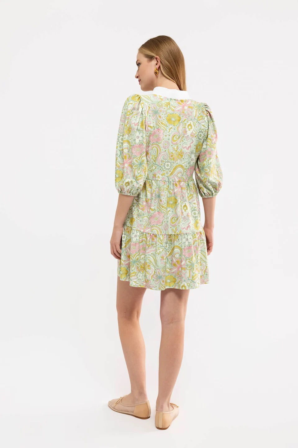 Smith & Quinn Tory Starry Eyed dress displayed on a mannequin with starry print fabric and stylish design.