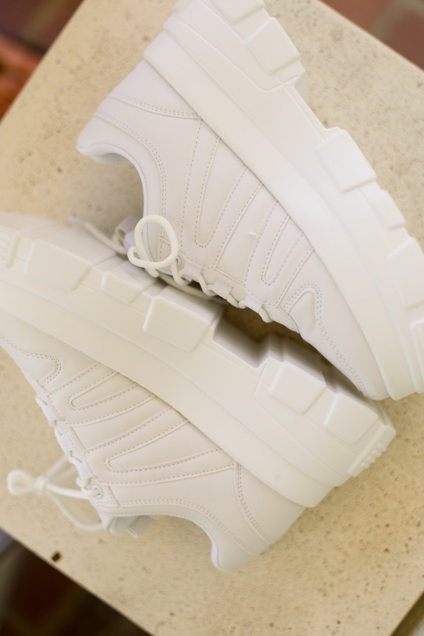 De Runway Footwear Just Kickin It sneakers in vibrant colors, showcasing stylish casual shoes with laces and modern design.