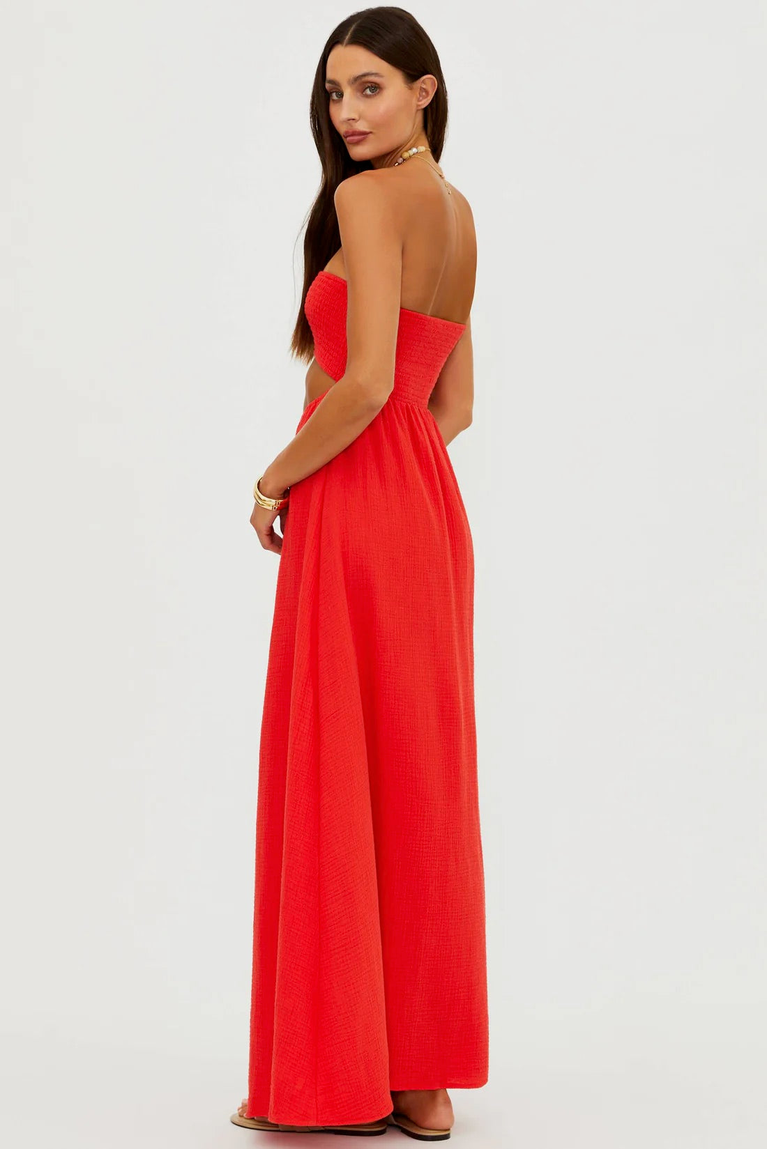 Beach Riot Yula Dress in Hot Haze with flowing fabric and strapless design, perfect for a stylish summer look.