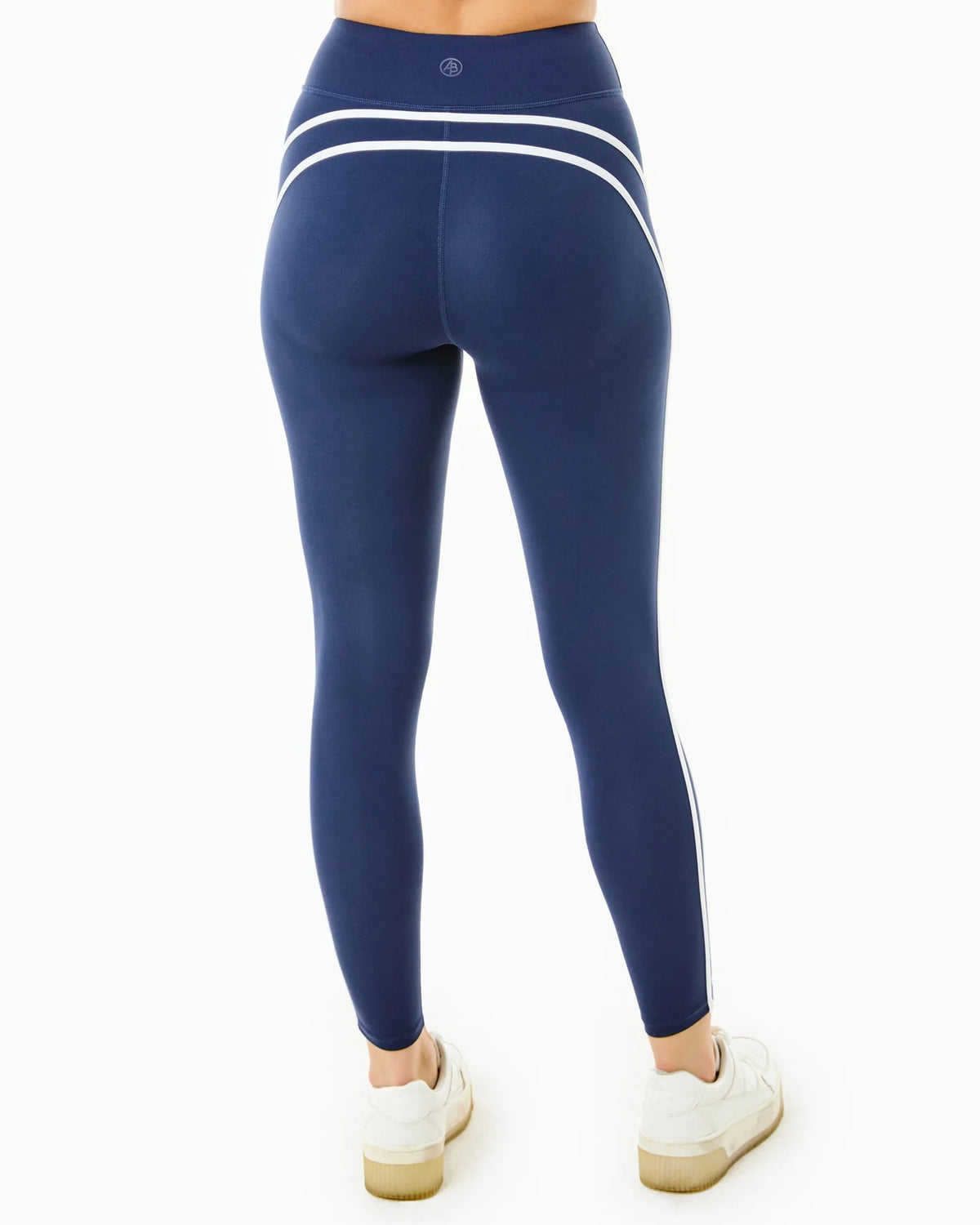 Addison Bay Chestnut Leggings displayed on a model, showing the snug fit and comfortable stretch of activewear leggings.