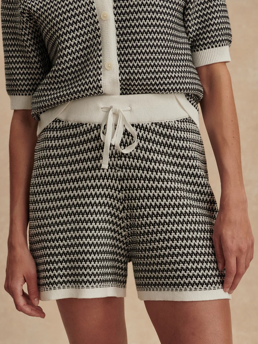 Varley Villiers Knit Shorts in Snow White and Black, showing a close-up of the stylish knit fabric and color contrast.