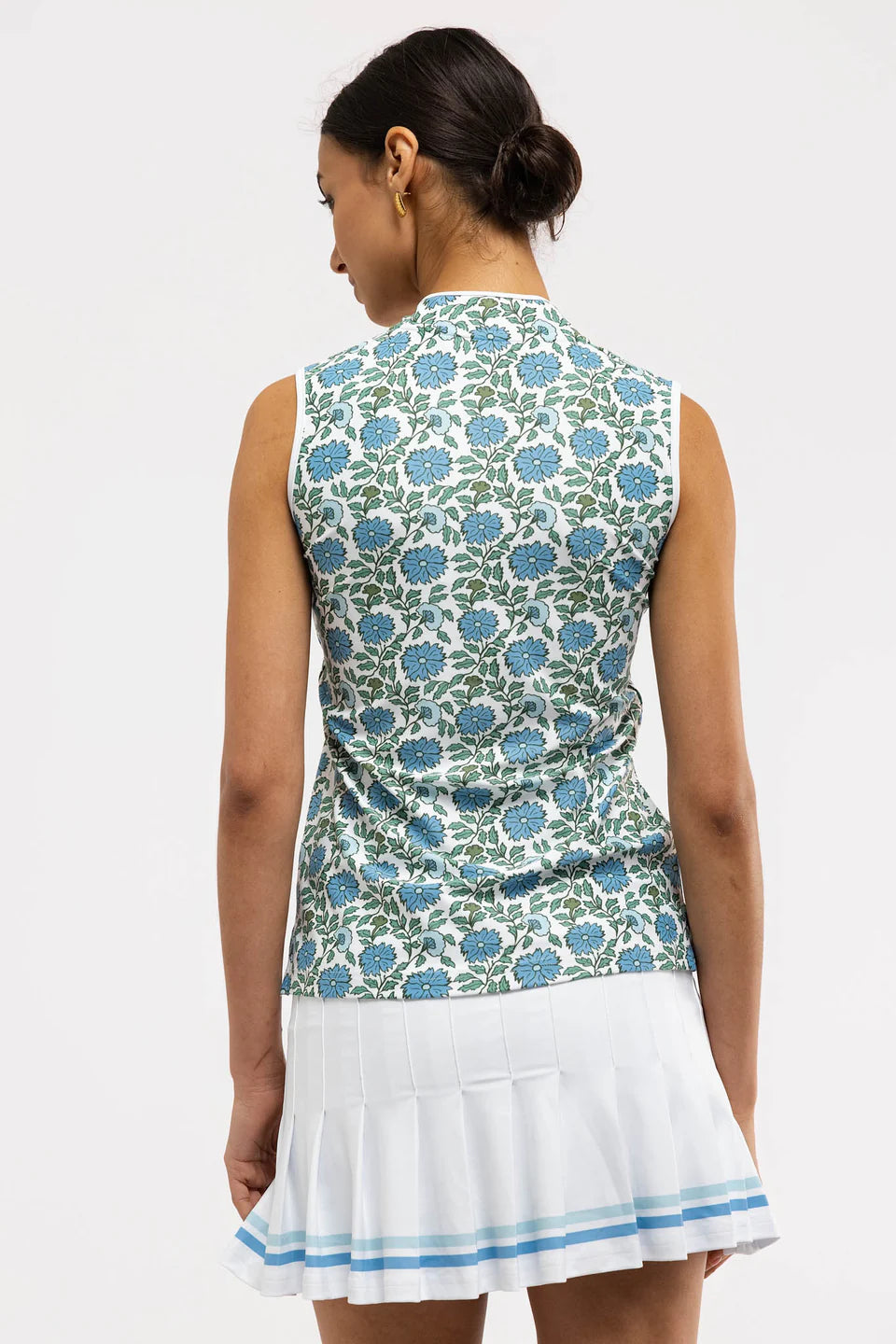 Smith & Quinn Kennedy Top by Seasalt Floral featuring a vibrant floral print and lightweight fabric, displayed on a hanger.