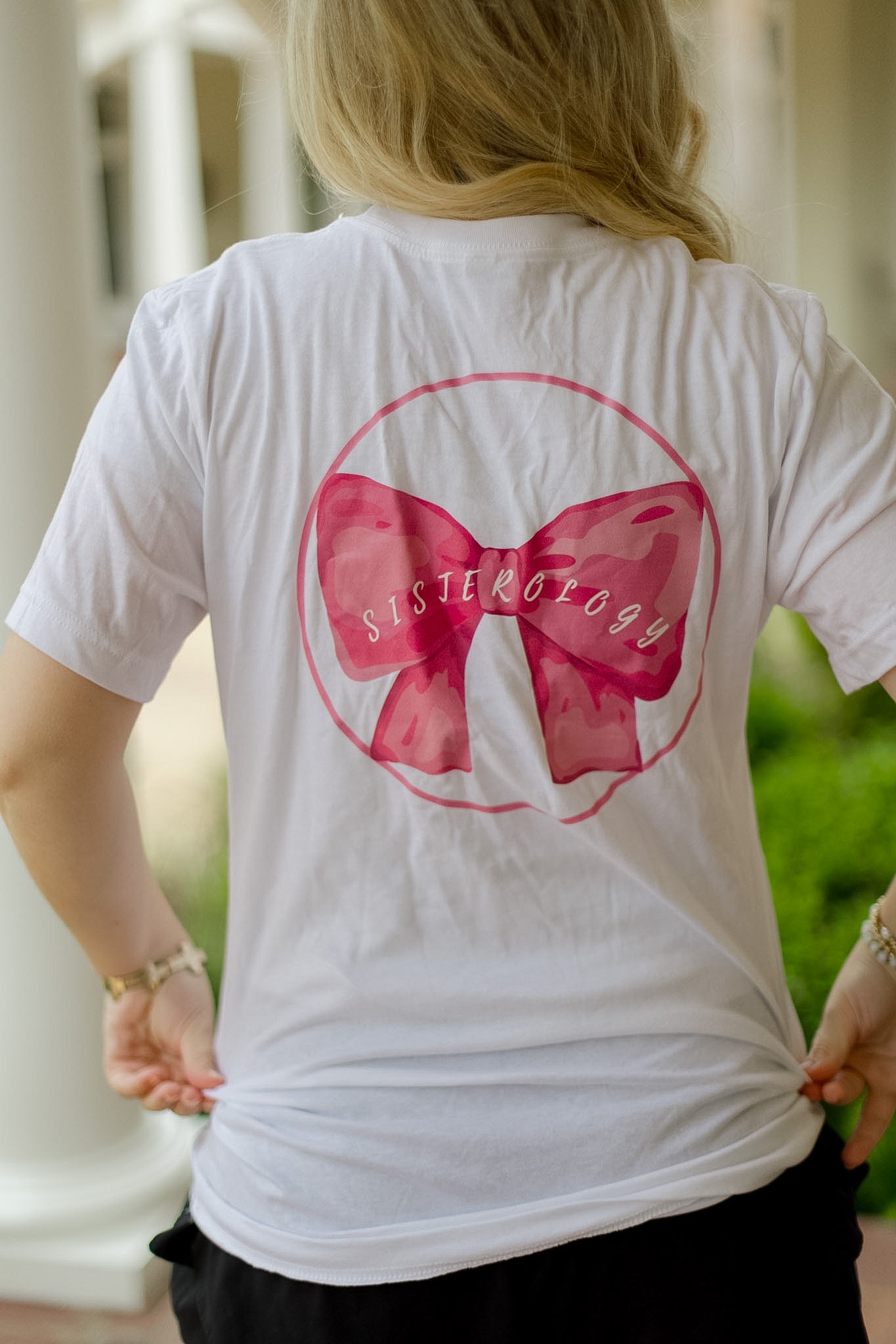 Boardwalk Sisterology Bow Tee from Merch, featuring a stylish graphic design on a casual cotton T-shirt.