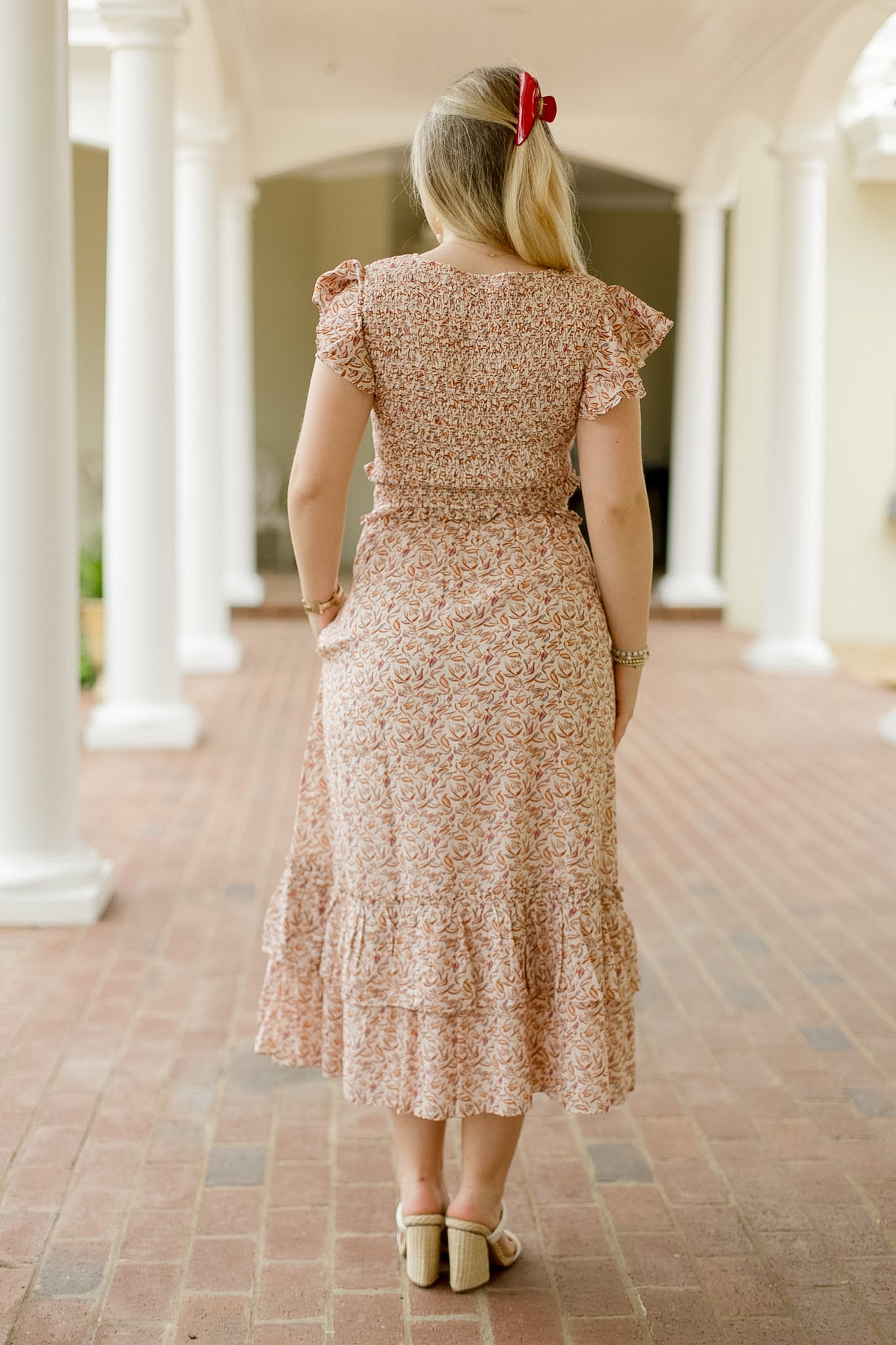 Narmeen Midi Dress by CLEOBELLA featuring a flowing silhouette and intricate wing-patterned fabric in soft, elegant tones.