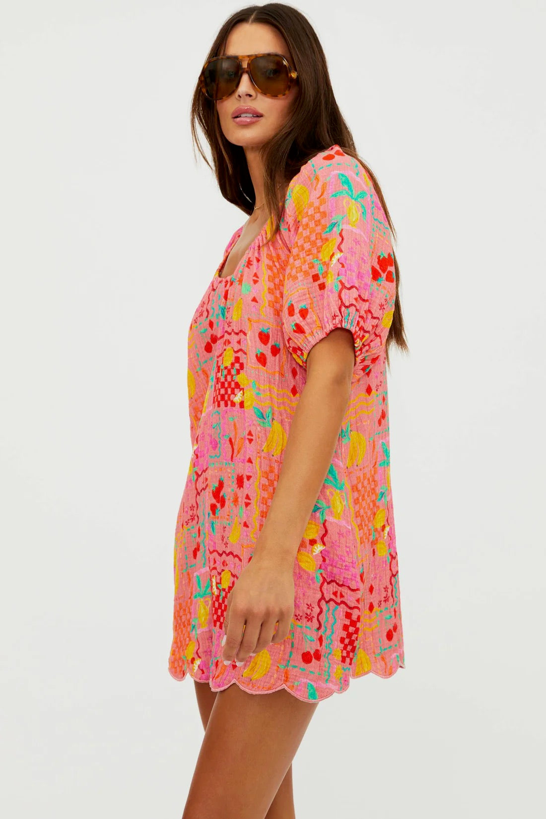 BEACHRIOT Ellery Romper in Passion Fruit, featuring vibrant floral print and lightweight fabric, suitable for summer wear.