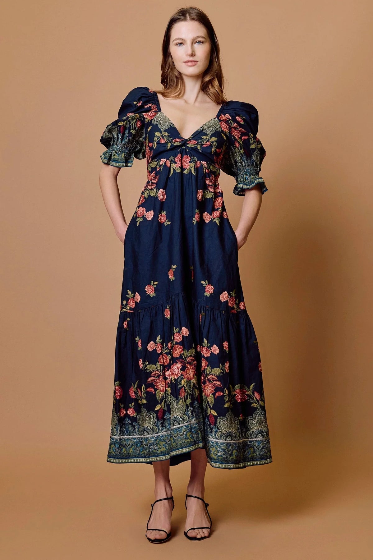 Eglantine Jewel Ankle Dress by CLEOBELLA featuring elegant floral embroidery and a fitted silhouette on a model.