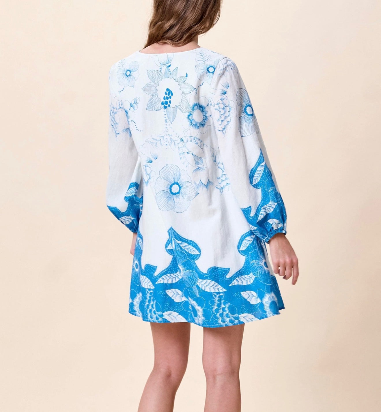 CLEOBELLA Noemie Mini Dress in Celestia with floral pattern and lightweight fabric, shown on a model.