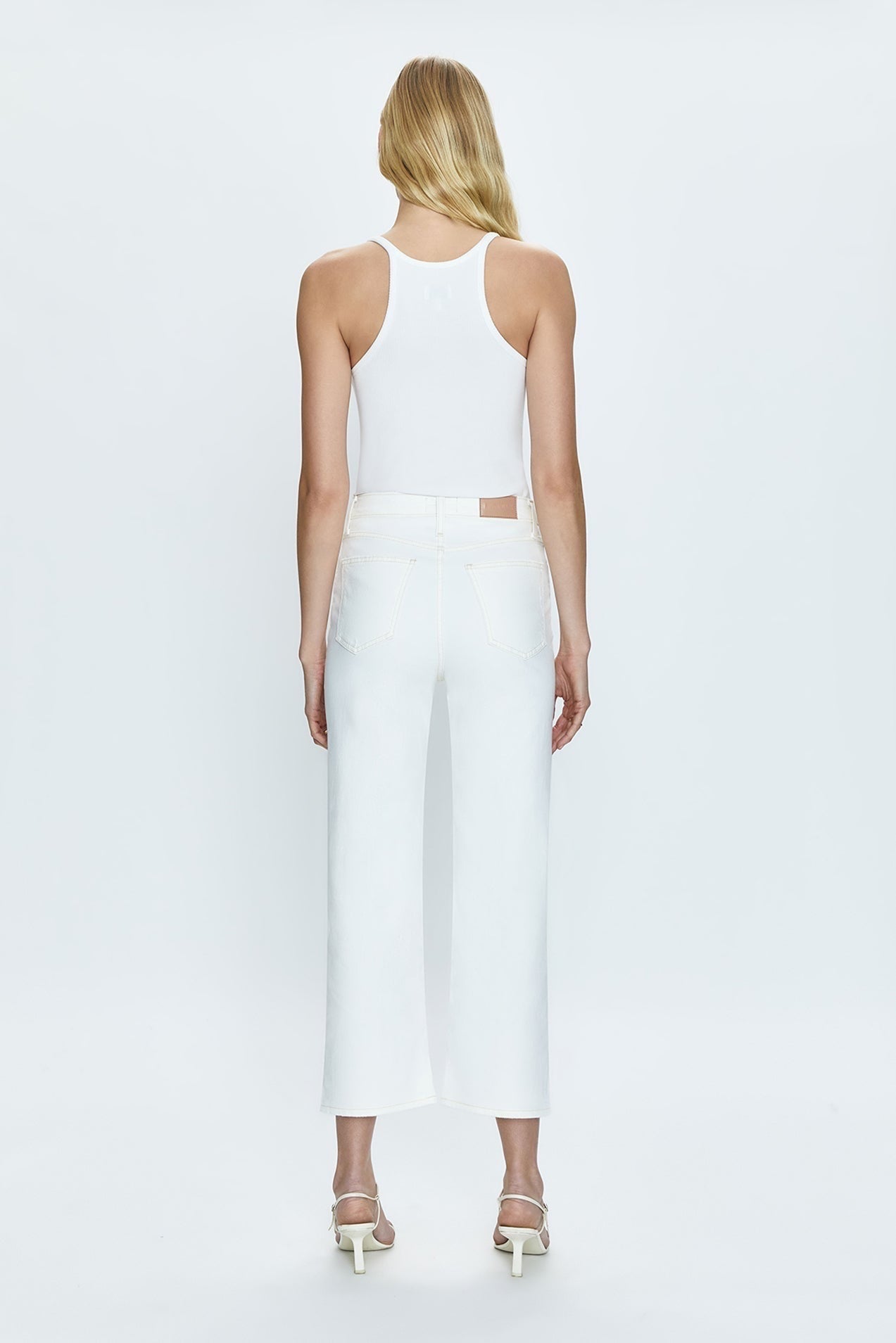 Pair of PISTOLA Cassie Crop Vintage Jean showing high-waisted fit, distressed details, and classic denim texture.