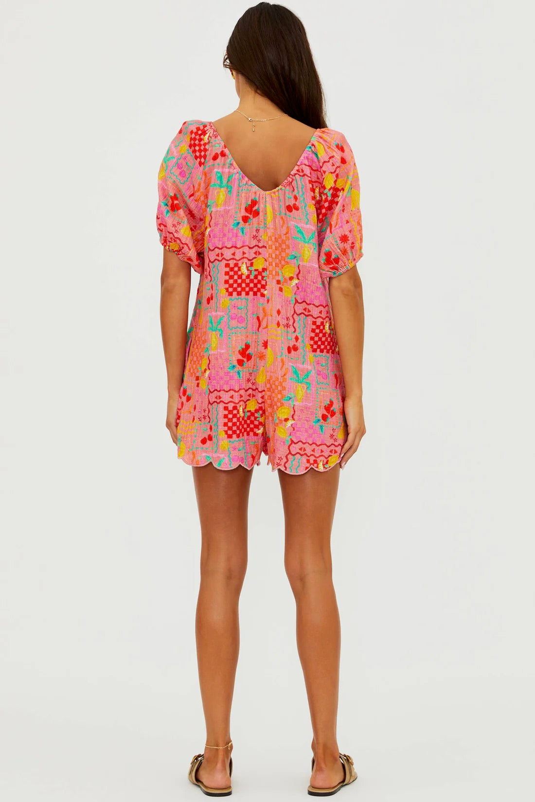 Beach Riot Ellery Romper in Passion Fruit, featuring vibrant floral print, sleeveless design, and relaxed fit, perfect for summer.