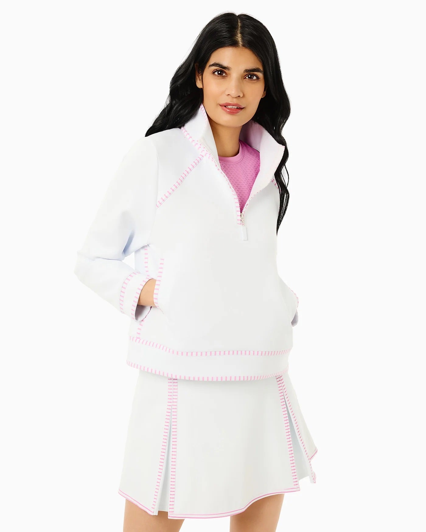 Addison Bay Bainbridge quarter zip in super white and orchid, featuring a stylish collar and soft fabric for casual wear.