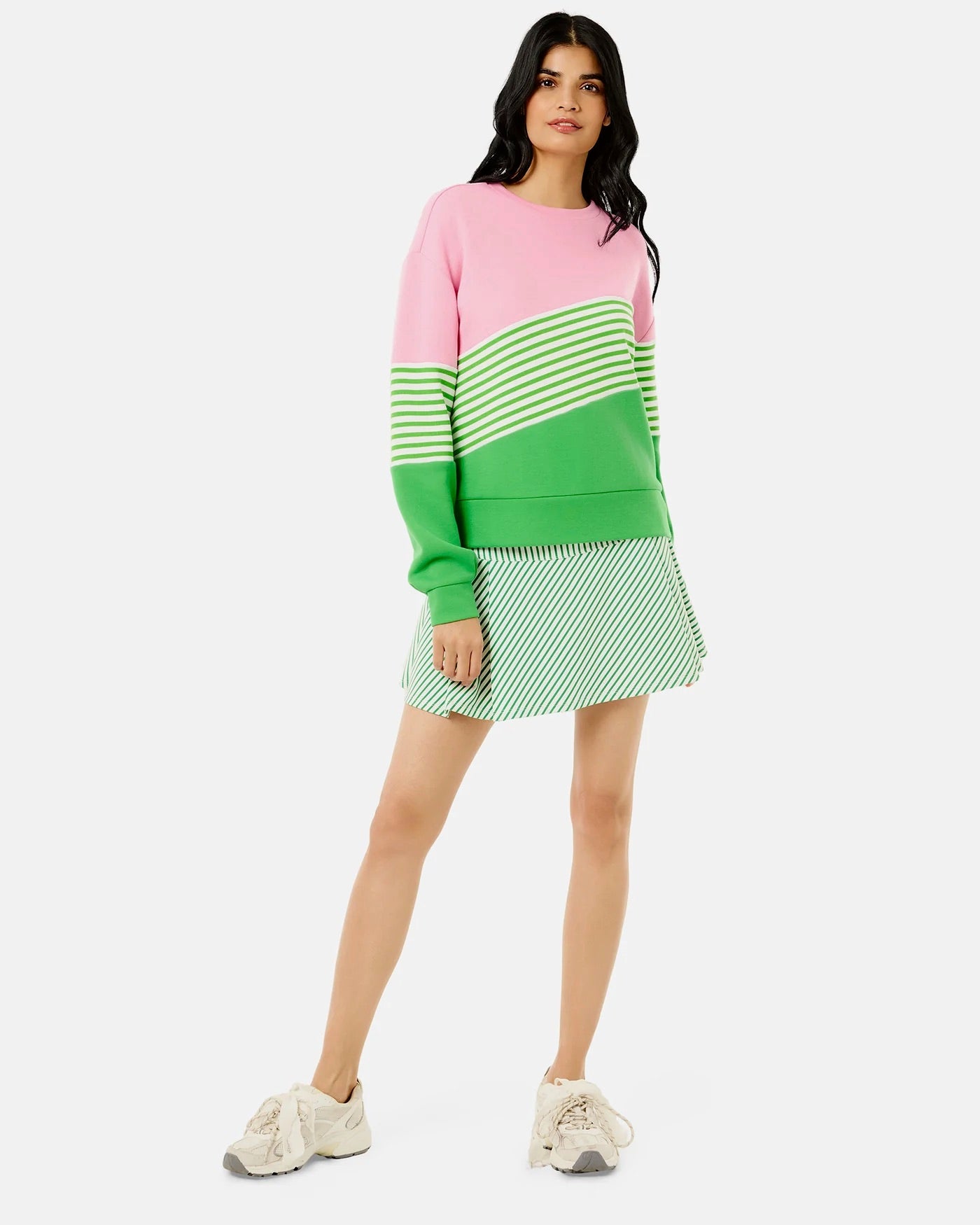 ADDISON BAY JV Crewneck in bubblegum and key lime, close-up of soft fabric and colorful color-block design.