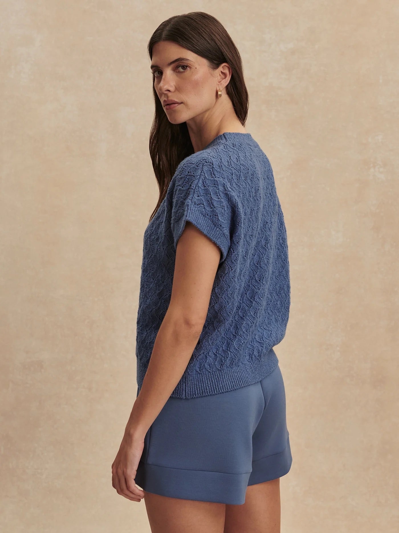 Varley Manae Pointelle Knit Top in Bijou Blue, featuring a lightweight, textured knit with a relaxed fit and ribbed details.