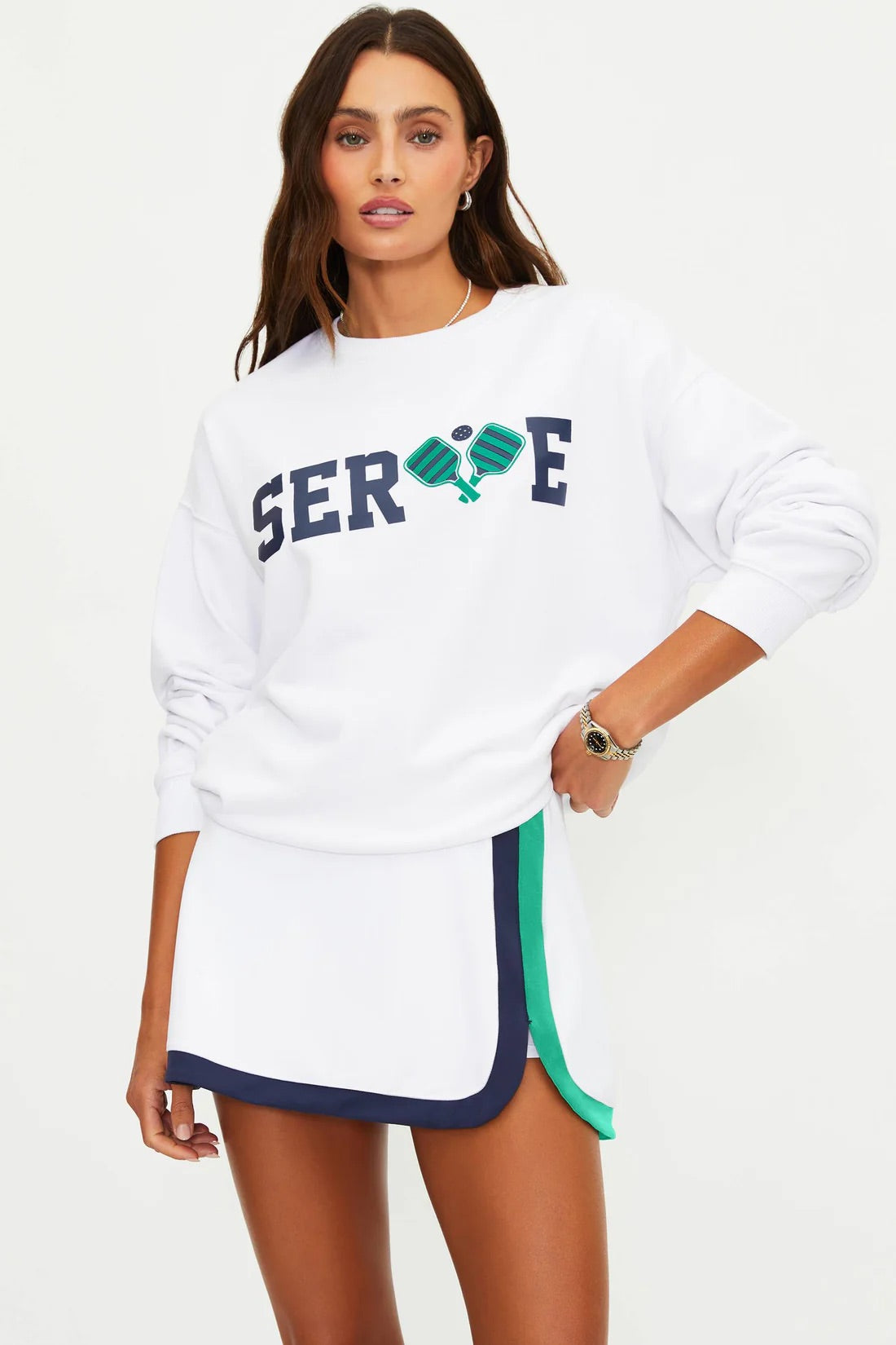 White Devyn oversized sweatshirt by BEACHRIOT, featuring a relaxed fit and soft fabric, displayed on a hanger.