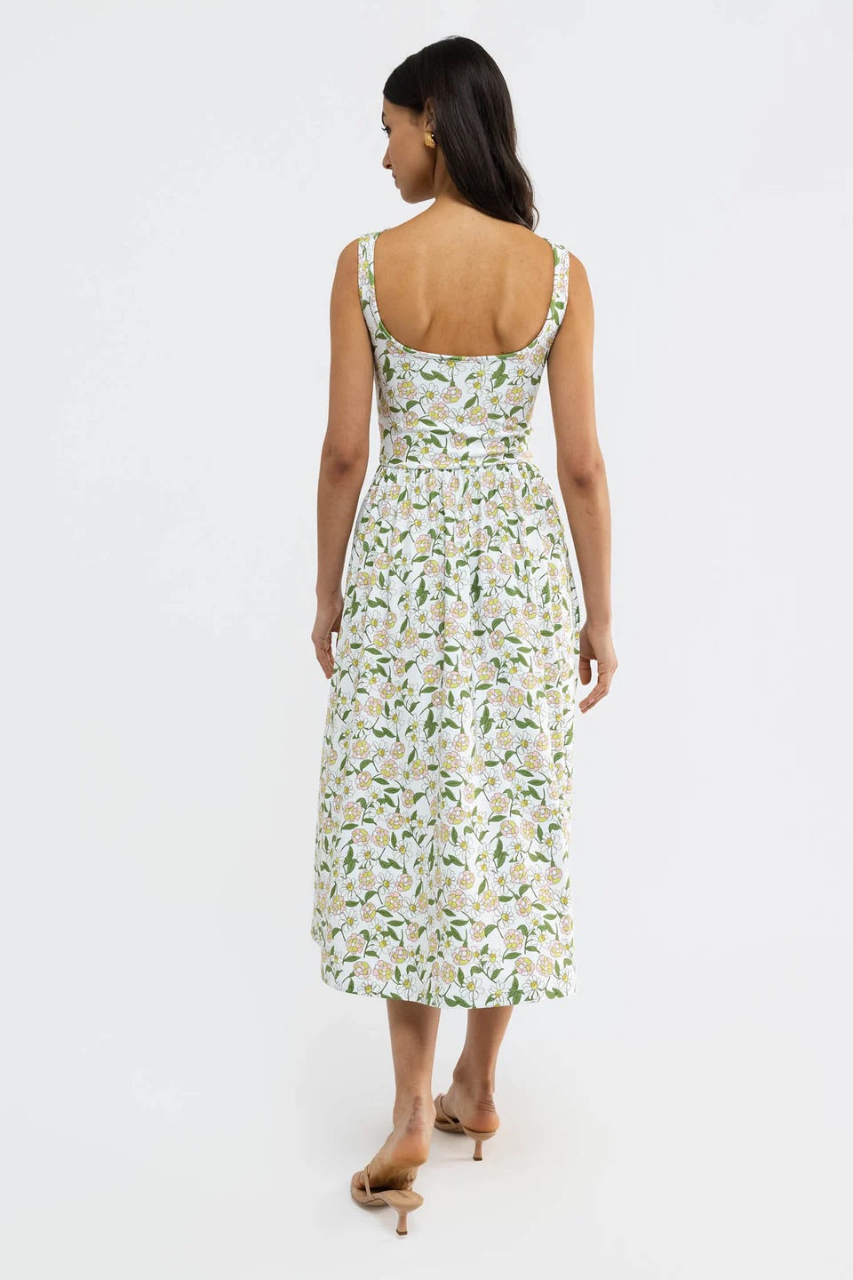 Izzy Dress by Smith & Quinn featuring a playful Oopsy Daisies print, sleeveless style with a fitted bodice and flared skirt.