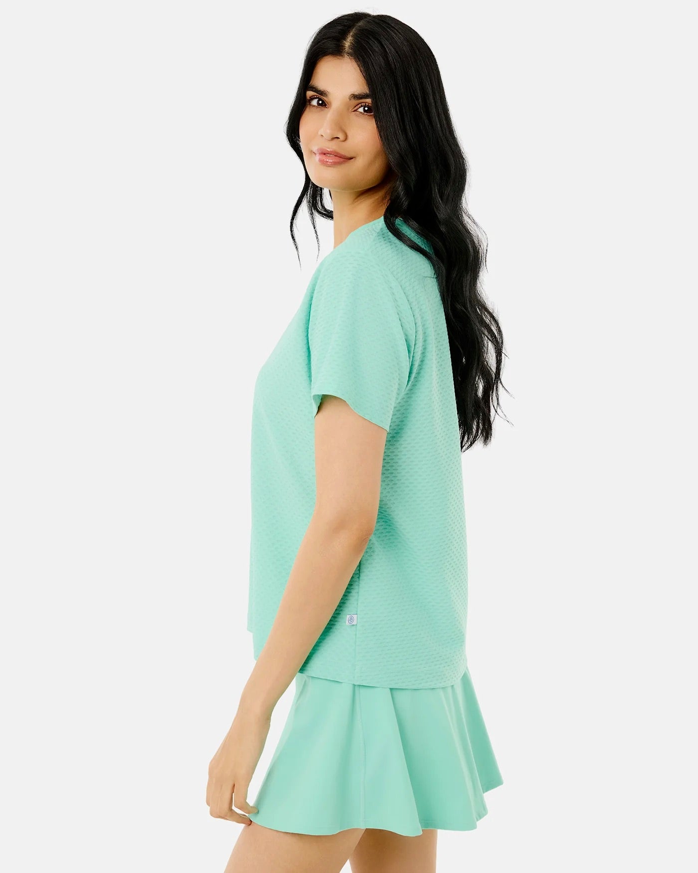 Walnut short sleeve shirt by Addison Bay featuring a jelly mint color, casual fit, and smooth fabric, displayed on a hanger.