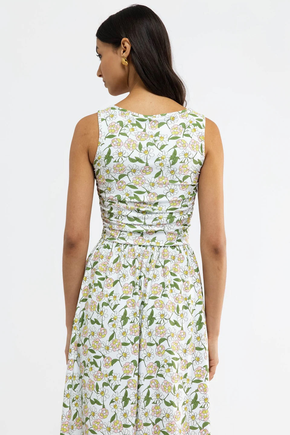 Izzy Dress by Smith & Quinn featuring a playful oopsy daisies pattern, displayed on a hanger against a neutral background.