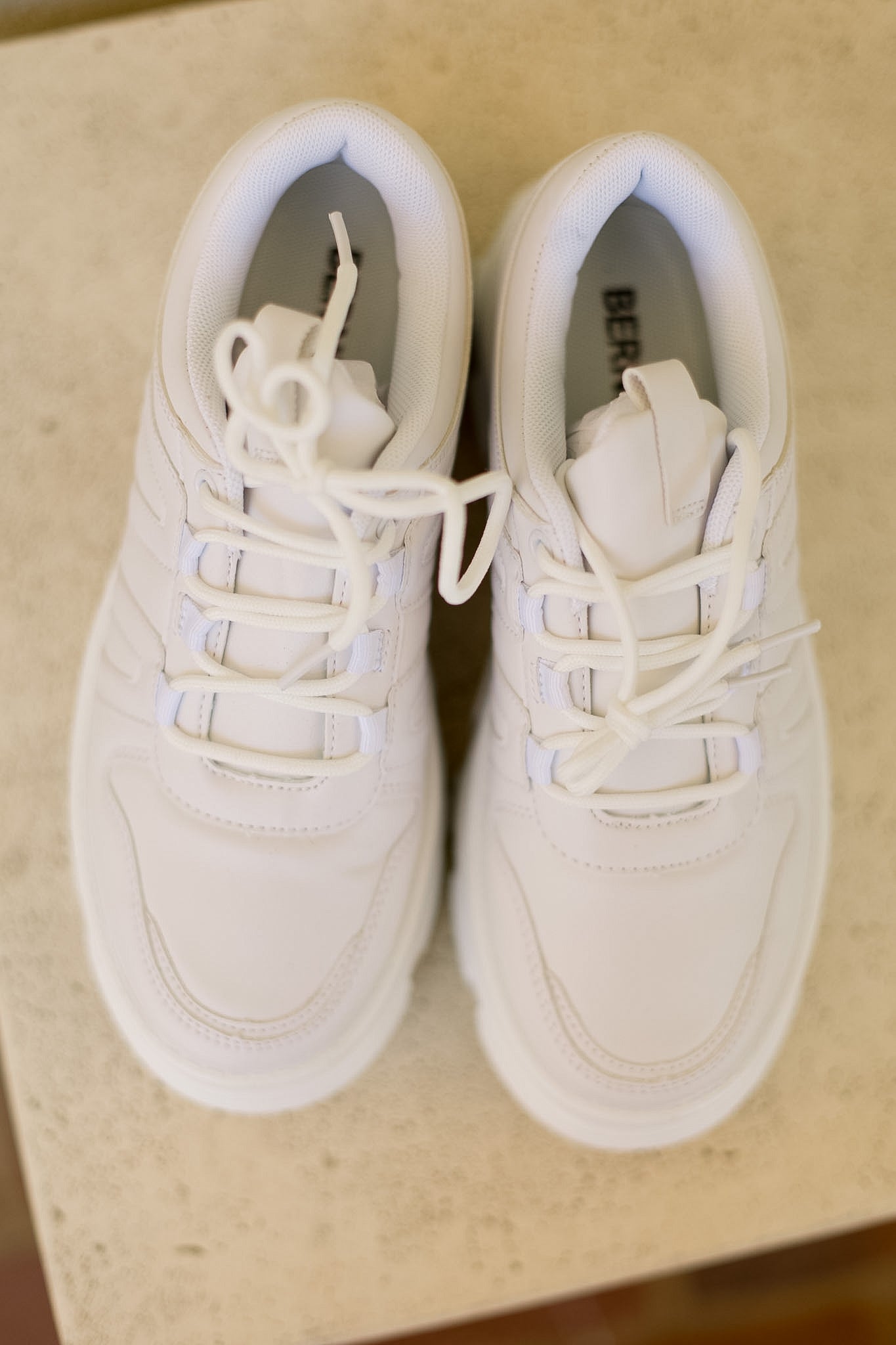 De Runway Footwear Just Kickin It sneakers, casual shoes with stylish design and comfortable fit, shown in a side view image.