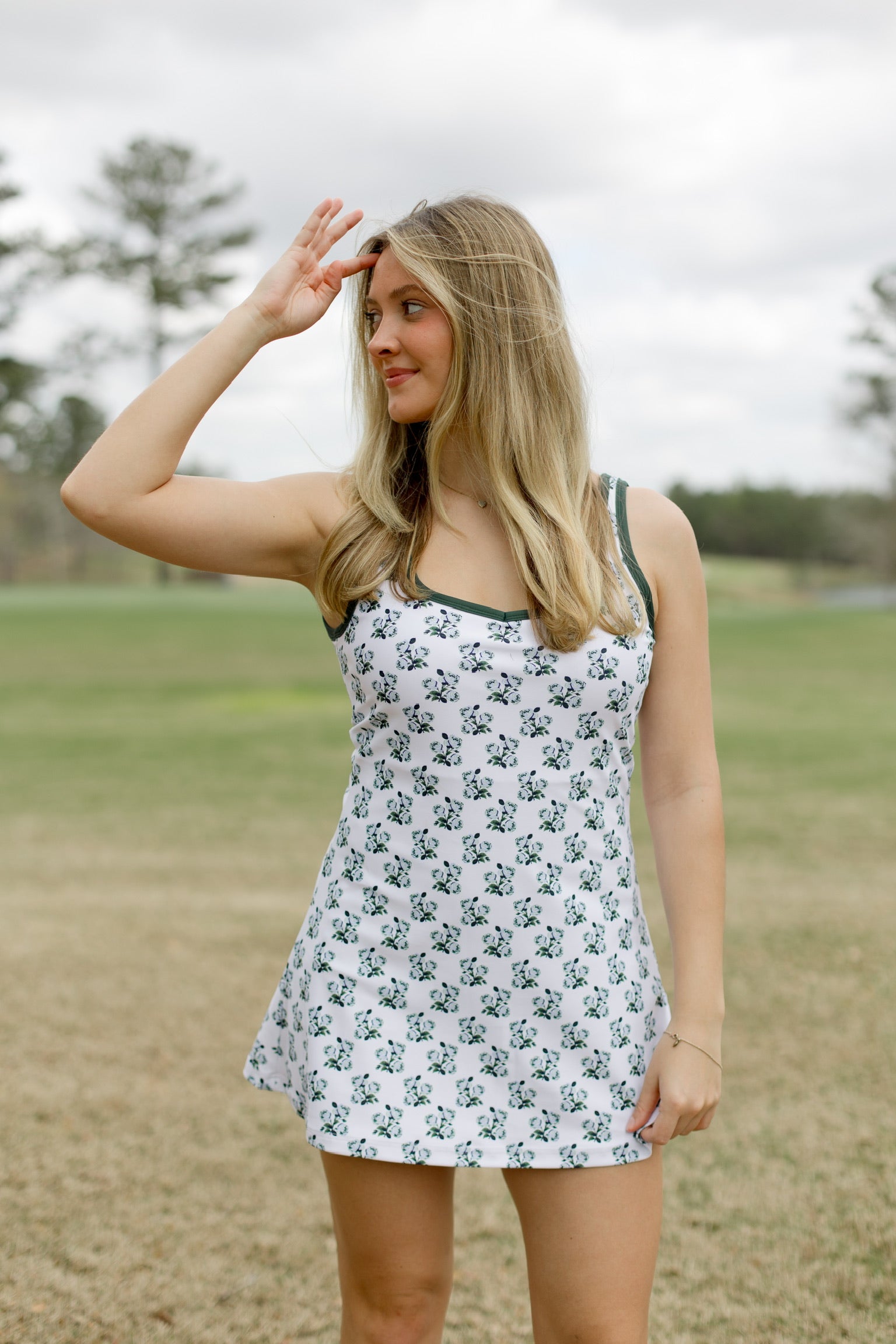 Smith & Quinn The Renee Dress in Rose Thorns floral pattern, showing a feminine, flowing dress with ruffled details and vibrant colors.