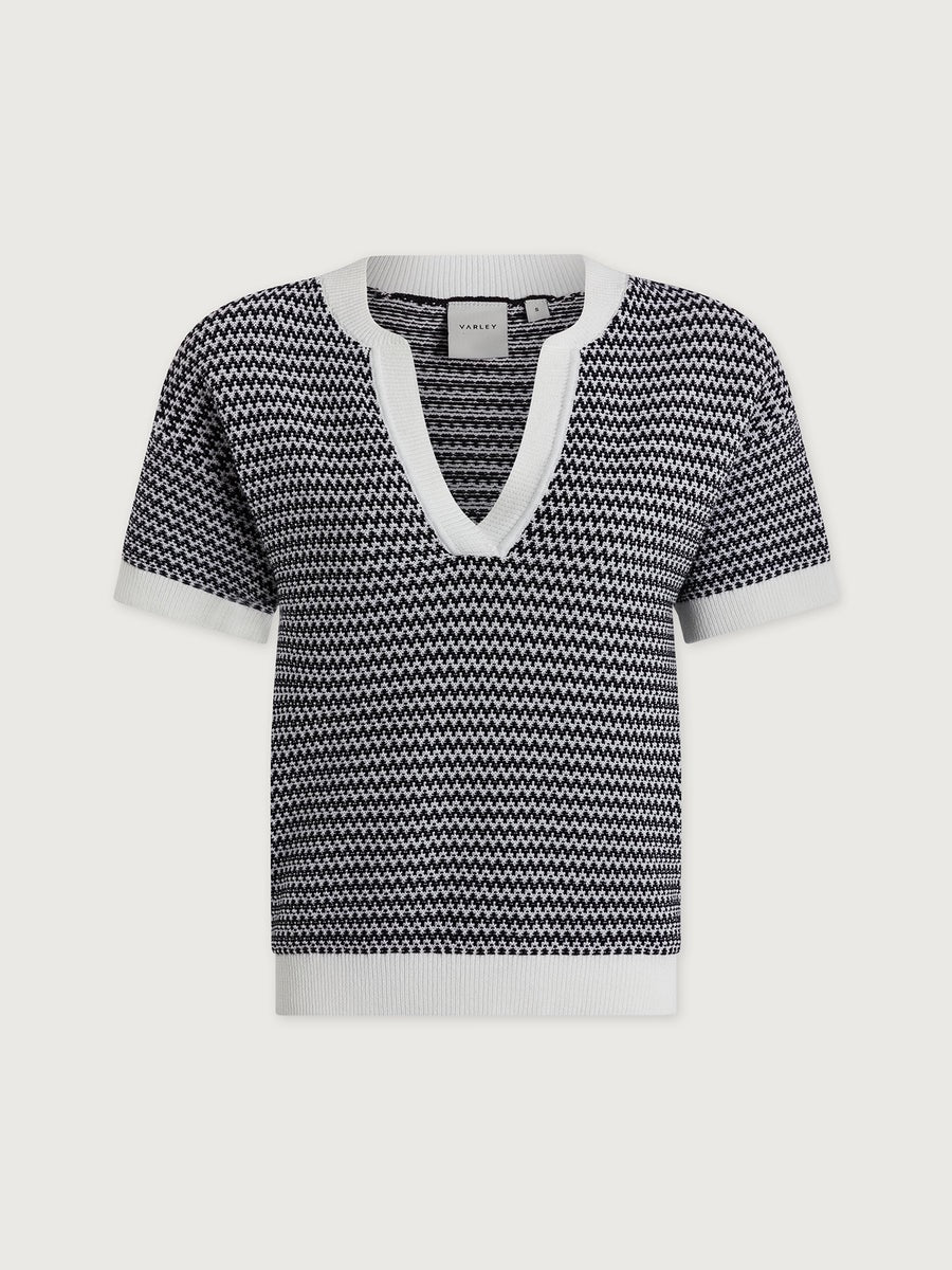 Varley Dora Knit Top 2.0 in snow white and black, featuring a cozy knit fabric, long sleeves, and stylish design.