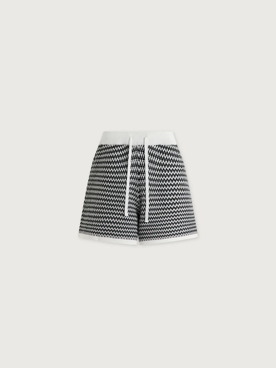 Varley Villiers Knit Shorts in Snow White and Black, showing a close-up of the stylish knit fabric and contrasting color details.