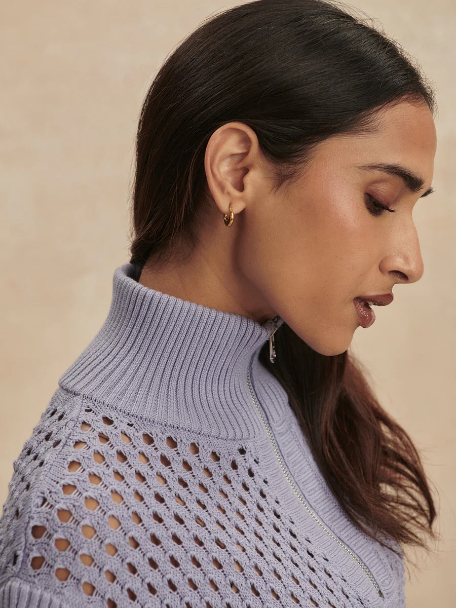 Varley Gaines Half Zip Knit in Thistle Down, a cozy wool sweater with a half-zip collar and textured knit pattern.